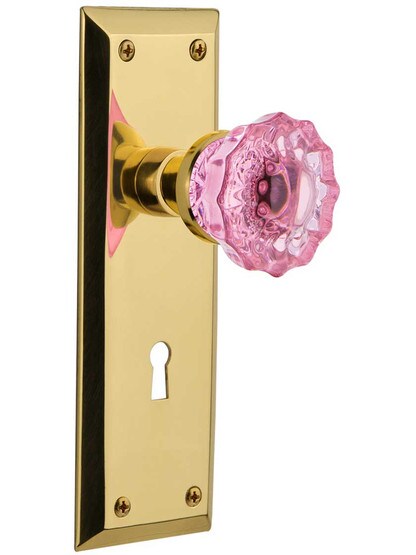 New York Mortise Lock Set with Colored Fluted Crystal Glass Knobs Pink in Un-Lacquered Brass.
